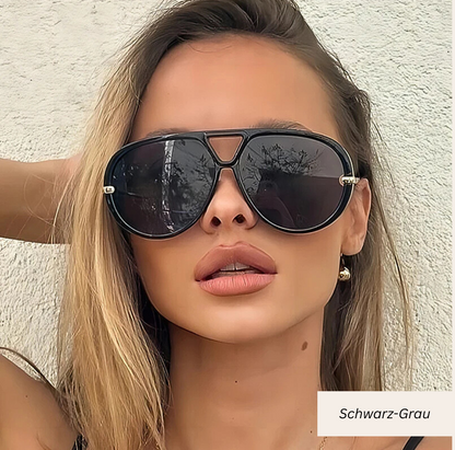 Soléa – Sonnenbrille mit integrierten Ohrringen
